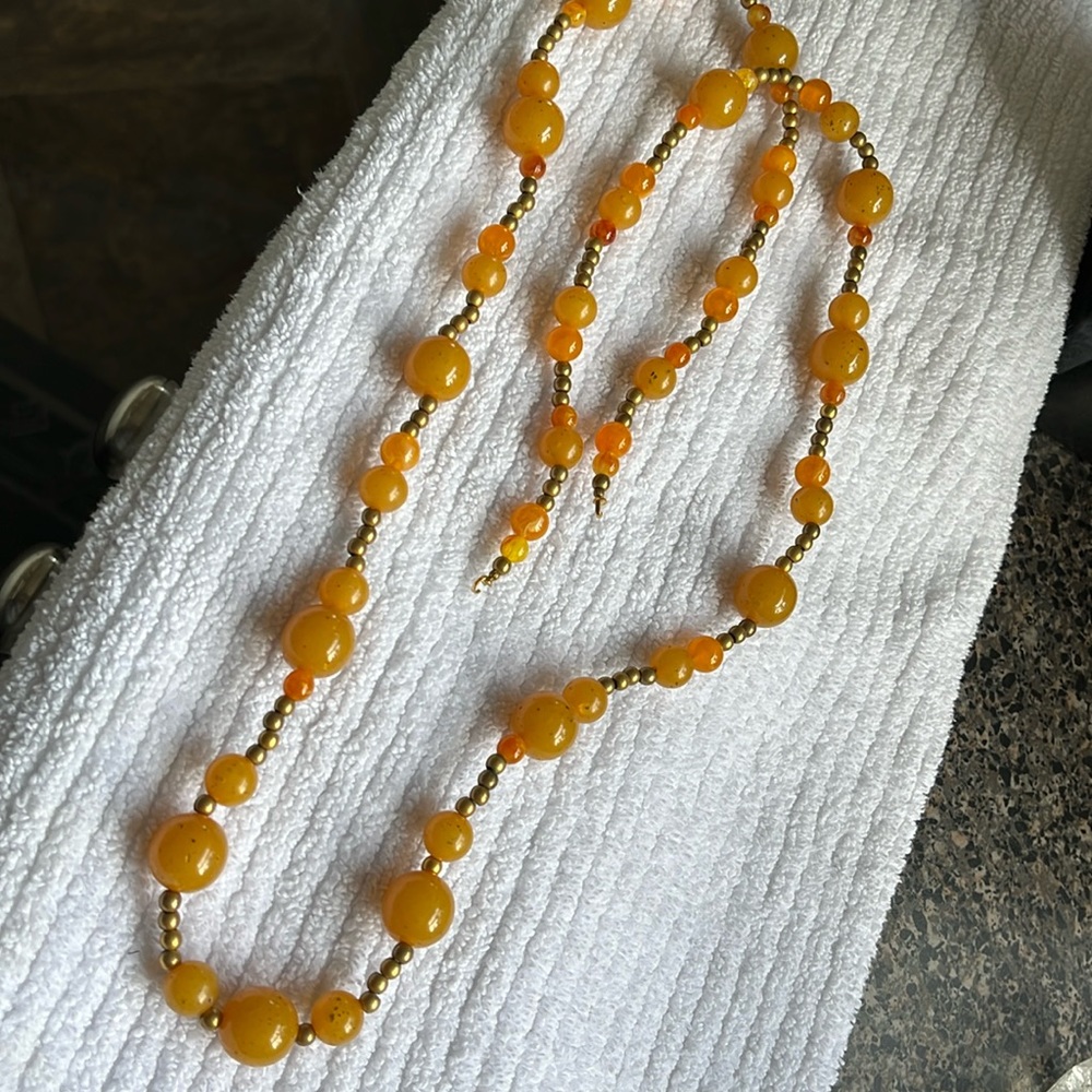 Vintage opera length brass & Bakelite necklace